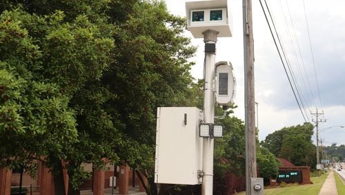 Marietta may soon add speed cameras like this one on U.S. Highway 78 next to South Gwinnett High School in Snellville. (Tyler Wilkins / tyler.wilkins@ajc.com)