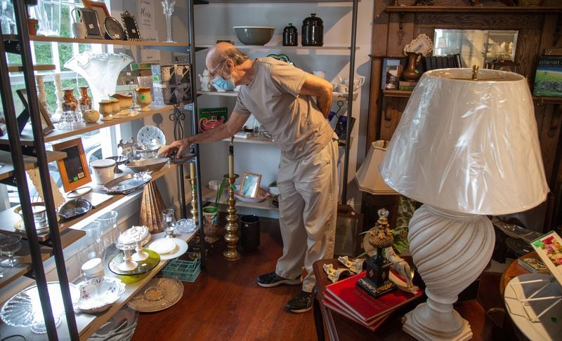  Dick Littafied looks over the merchandise at the Giving Tree Thrift Store in Chamblee Saturday, October 24, 2020.  STEVE SCHAEFER / SPECIAL TO THE AJC 