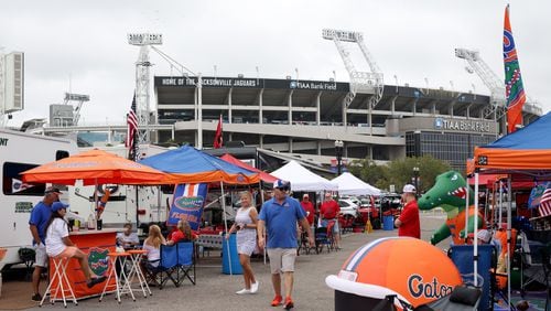 Florida and Georgia fans mingle at RV City outside of TIAA Bank Field, Friday, October 28, 2022, in Jacksonville, Florida. Georgia fans prepare for the annual Georgia-Florida game on Saturday. (Jason Getz / Jason.Getz@ajc.com)