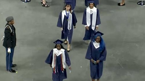 South Gwinnett High School seniors walk to their seats at the start of the 2024 graduation ceremony. (Courtesy of Gwinnett County Public Schools)