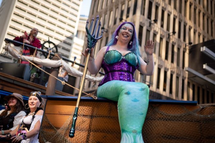 Thousands lined up along Peachtree Street Saturday morning for the annual Dragon Con parade.