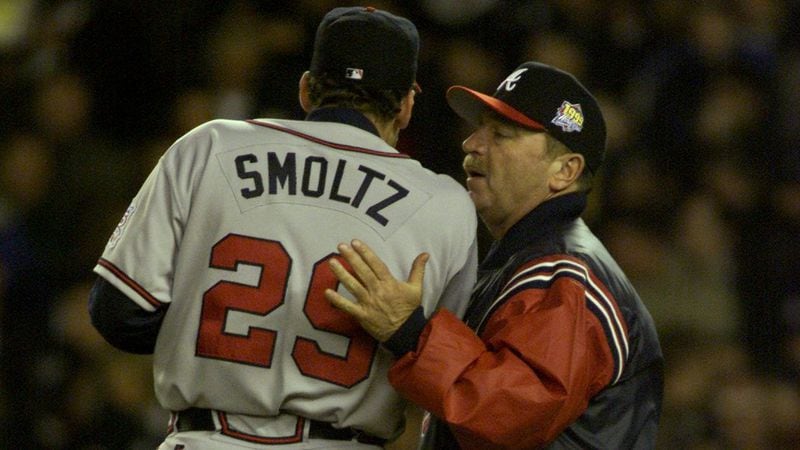 Atlanta pitching coach Leo Mazzone (right) tries to encourage starting pitcher John Smoltz on the mound on Wednesday, Oct. 27, 1999, at Yankee Stadium during Game 4 of the World Series against the New York Yankees. (Curtis Compton / curtis.compton@ajc.com)