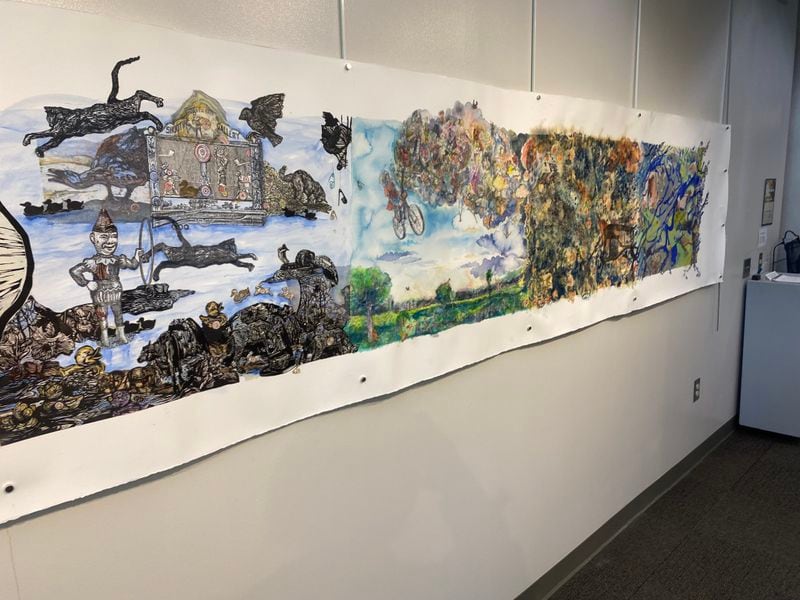 The collaborative scroll created by the six Atlanta artists in the exhibit "I, We, and the Space Between," at the JCLRC Gallery at Perimeter College. It continues through Feb. 29.