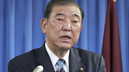 Shigeru Ishiba, the head of Japan's governing party, the Liberal Democratic Party speaks during a press conference at the party's headquarters in Tokyo Monday, Sept. 30, 2024 to announce that he plans to call a parliamentary election on Oct. 27 after he is formally elected as prime minister. (Kyodo News via AP)