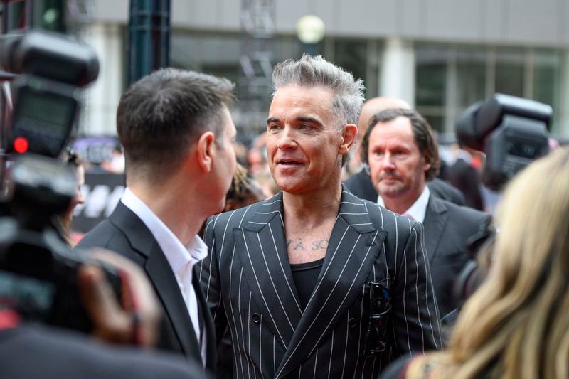 Robbie Williams attends the premiere of "Better Man", during the 2024 Toronto International Film Festival, in Toronto on Monday, Sept. 9, 2024. (Christopher Katsarov/The Canadian Press via AP)