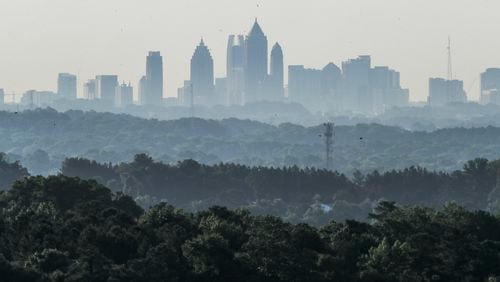 The Atlanta skyline is shown enveloped in haze on Thursday morning, June 16, 2022. (John Spink / John.Spink@ajc.com)