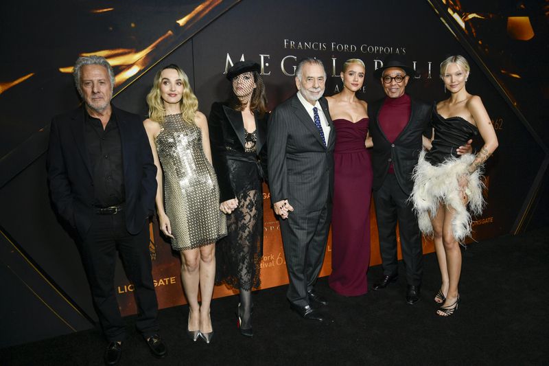 Dustin Hoffman, from left, Chloe Fineman, Aubrey Plaza, Francis Ford Coppola, Nathalie Emmanuel, Giancarlo Esposito, and Grace VanderWaal attend the premiere of "Megalopolis" on Monday, Sept. 23, 2024, at AMC Lincoln Square in New York. (Photo by Evan Agostini/Invision/AP)