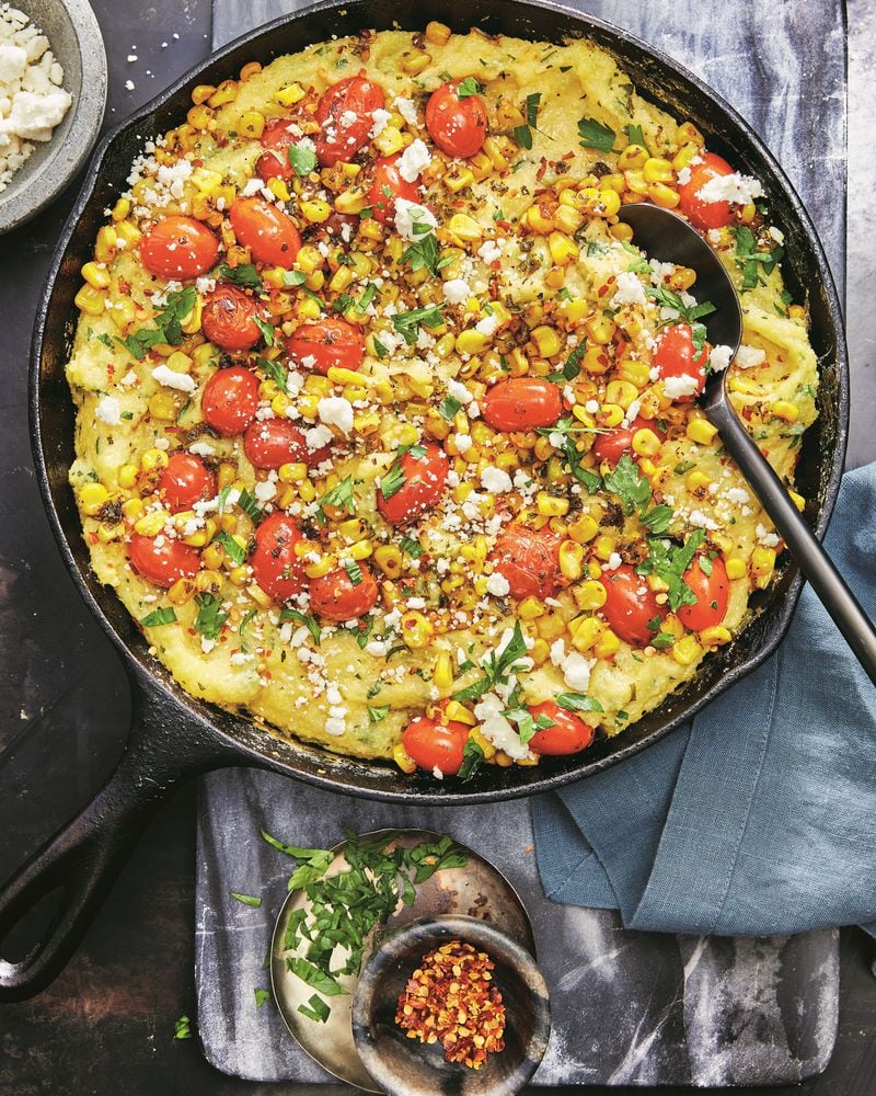 Skillet Corn-and-Tomato Baked Polenta makes a great meatless meal when paired with a green salad, or an elevated side dish to a meaty main.
 
Reprinted with permission from “The Mediterranean Dish: Simply Dinner” by Suzy Karadsheh, copyright© 2024. Photographs by Caitlin Bensel. Published by Clarkson Potter, a division of Penguin Random House, LLC.