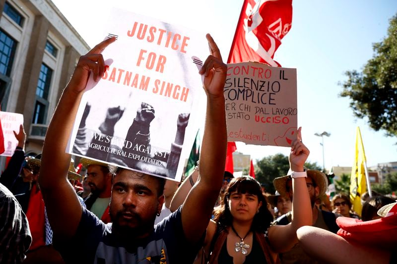 Members of the Indian community in Italy protest in Latina, some 60 kilometers south of Rome, Saturday, June 22, 2024, asking justice for Satnam Singh, an Indian laborer, bled to death after his arm got stuck in a nylon-wrapping machine and was wrenched off. Police on Tuesday arrested Antonello Lovato, a farm owner on suspicion of homicide after he allegedly refused entreaties by Singh's wife, who also worked at the farm, to call an ambulance, claiming he was already dead. (Cecilia Fabiano/LaPresse via AP)