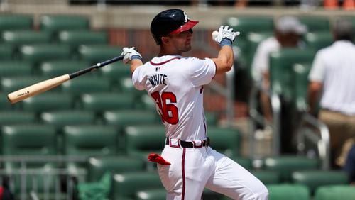 Atlanta Braves left fielder Eli White hits a two-run double during the eighth inning against the Milwaukee Brewers at Truist Park, Thursday, August 8, 2024, in Atlanta. The Braves lost 16-7. (Jason Getz / AJC)
