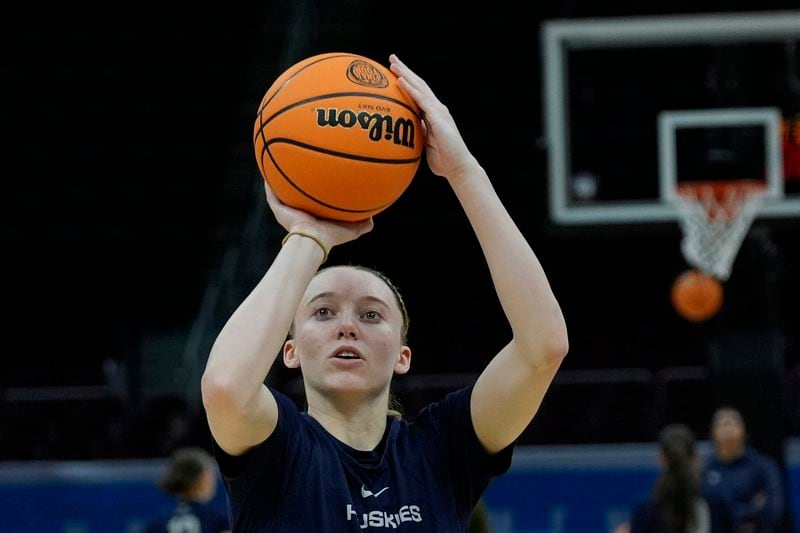 FILE - UConn's Paige Bueckers shoots during a practice for an NCAA Women's Final Four semifinals basketball game Thursday, April 4, 2024, in Cleveland. (AP Photo/Carolyn Kaster, file)