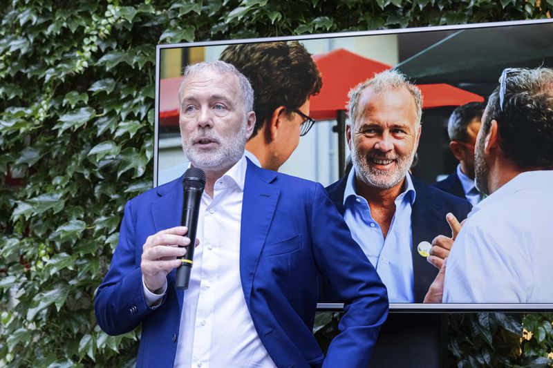 Paolo Damilano speaks at the closing of his election campaign at the electoral committee headquarters in Piazza Carlo Felice in Turin, Italy, Thursday, June 6, 2024. (Giacomo Longo/LaPresse via AP)