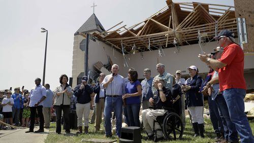 Vice President Mike Pence, with his wife, Karen, speaks to residents affected by Hurricane Harvey during a visit to the First Baptist Church in Rockport on Aug. 31. Nearly 894,000 people in Texas met last week’s deadline to register for federal disaster assistance, the Federal Emergency Management Agency says. (AP Photo/Eric Gay, File)