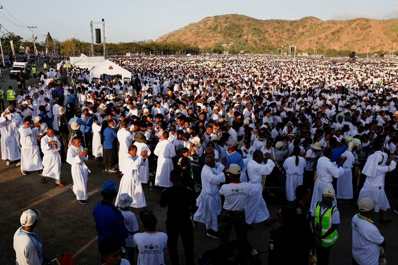 Faithful gather at the Esplanade of Taci Tolu during Pope Francis' apostolic trip to Asia, in Dili, East Timor, Tuesday, Sept. 10, 2024. (Willy Kurniawan/Pool Photo via AP)