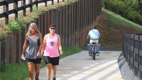 Two walkers come up the newly built ramp to the Armuchee Connector, which is part of the Mount Berry Trail loop. (Photo Courtesy of Adam Carey)