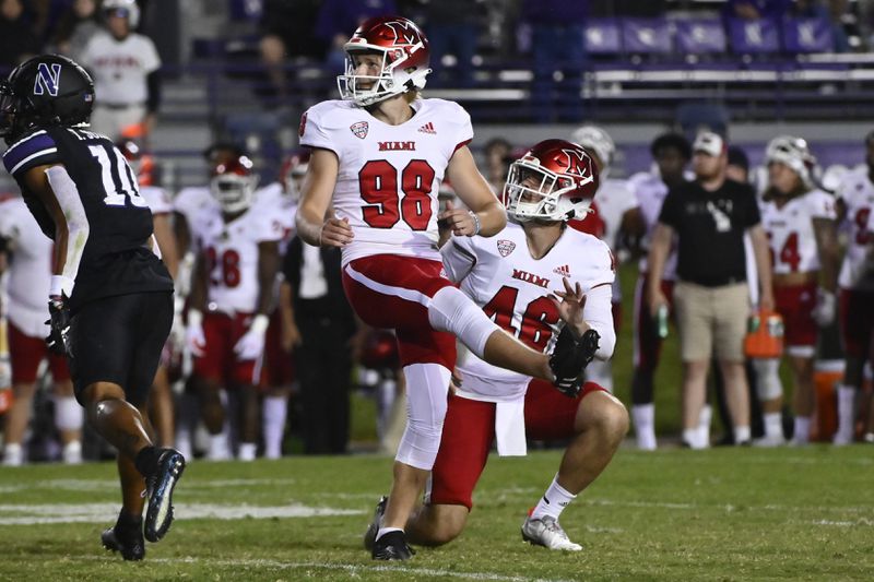 FILE - Then-Miami (Ohio) place kicker Graham Nicholson (98) looks on after kicking the game winning field goal against Northwestern as Alec Bevelhimer holds the ball during the second half of an NCAA college football game Saturday, Sept. 24, 2022, in Evanston, Ill. (AP Photo/Matt Marton, File)