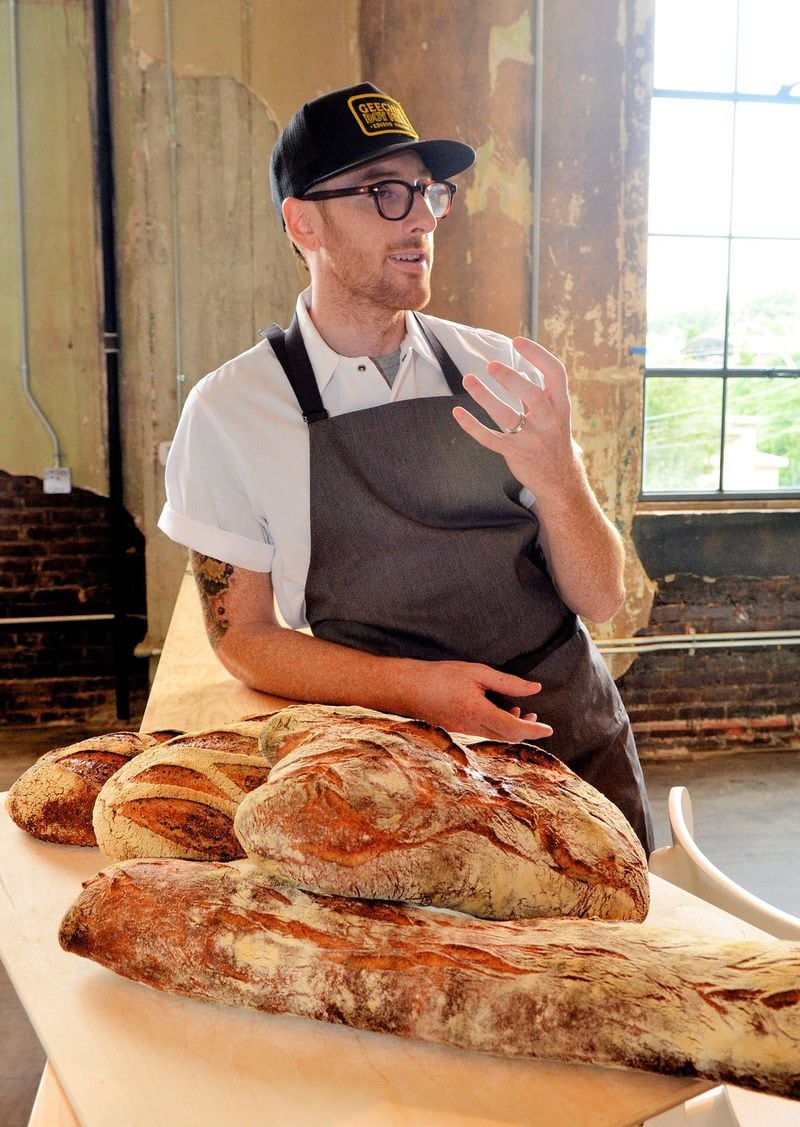 Chris Wilkins of Root Baking Co. sources his grains from numerous farms around the country and mills them in-house. Chris Hunt for The Atlanta Journal-Constitution 