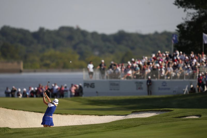 Europe's Anna Nordqvist hits from a bunker on the 15th hole during a Solheim Cup golf tournament fourball match at Robert Trent Jones Golf Club, Saturday, Sept. 14, 2024, in Gainesville, Va. (AP Photo/Matt York)