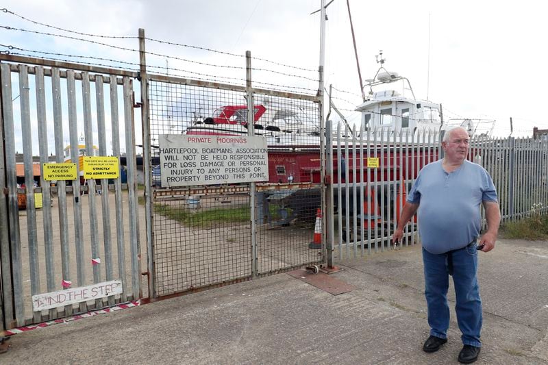 Fisherman Stan Rennie is pictured by the boat yard in Hartlepool, England, Thursday June. 27, 2024. As British voters prepare to choose a new government on Thursday, Hartlepool’s statistics still tell a sobering story. Compared the country as a whole, it has higher unemployment, lower pay, shorter life expectancy, more drug deaths and worse crime rates. (AP Photo/Scott Heppell)