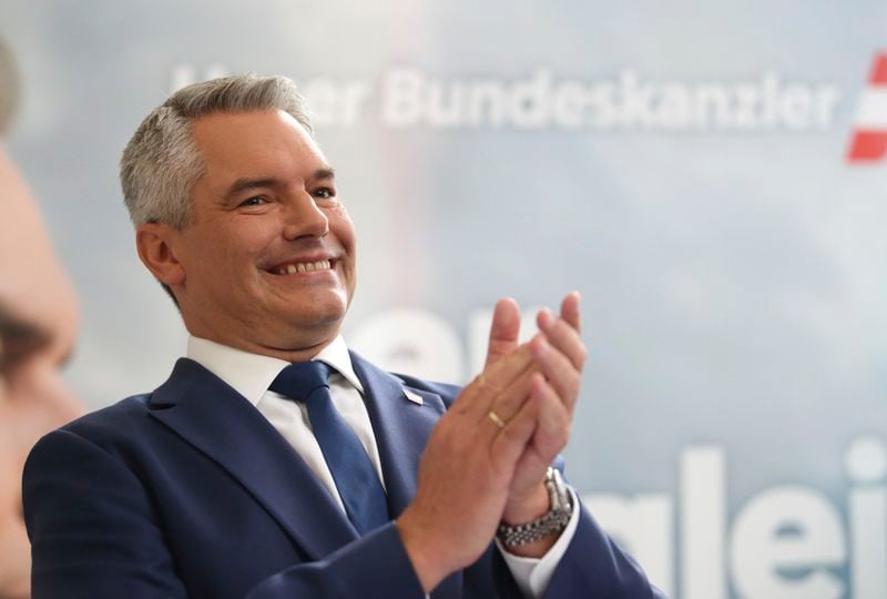 Austrian Chancellor Karl Nehammer of the Peoples Party (OeVP) attends his final election rally in Vienna, Austria, Friday, Sept. 27, 2024. (AP Photo/Heinz-Peter Bader)