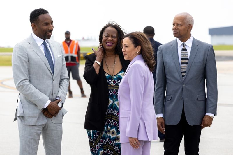 (Left to right) Mayor Andre Dickens; Dekalb County Commissioner Mereda Johnson; and U.S. Rep. Hank Johnson, D-Lithonia, greet Vice President Kamala Harris as she arrives in Atlanta on June 18.