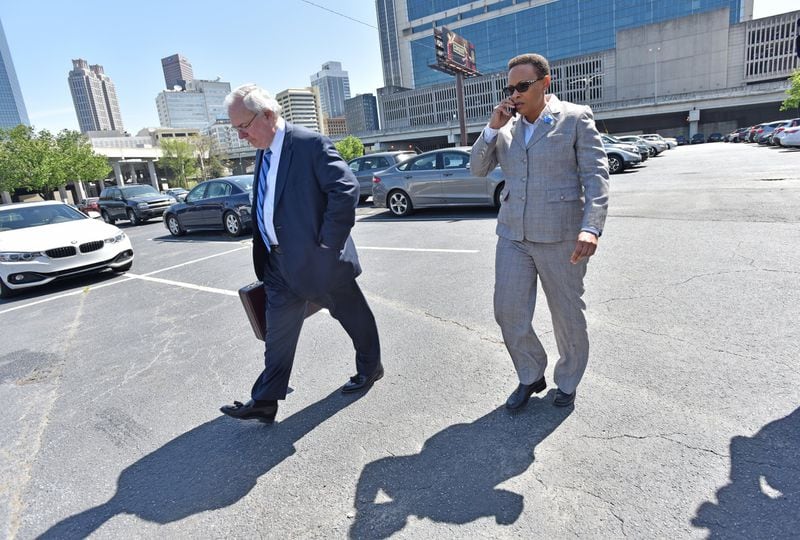 April 5, 2018 Atlanta - Rev. Mitzi Bickers, right, and her attorney Richard Hendrix the Richard B. Russell Federal Building after her first appearance in federal court on Thursday, April 5, 2018. Rev. Mitzi Bickers made her first appearance in federal court Thursday to face charges that she took $2 million in bribes to steer city of Atlanta contracts to at least two contractors from 2010 to 2015. She was released on a $50,000 appearance bond. HYOSUB SHIN / HSHIN@AJC.COM