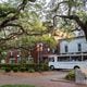 A Savannah Tours bus makes it way through Savannah's Chippewa Square on May 3. (Rosana Lucia/The Atlanta Journal-Constitution)