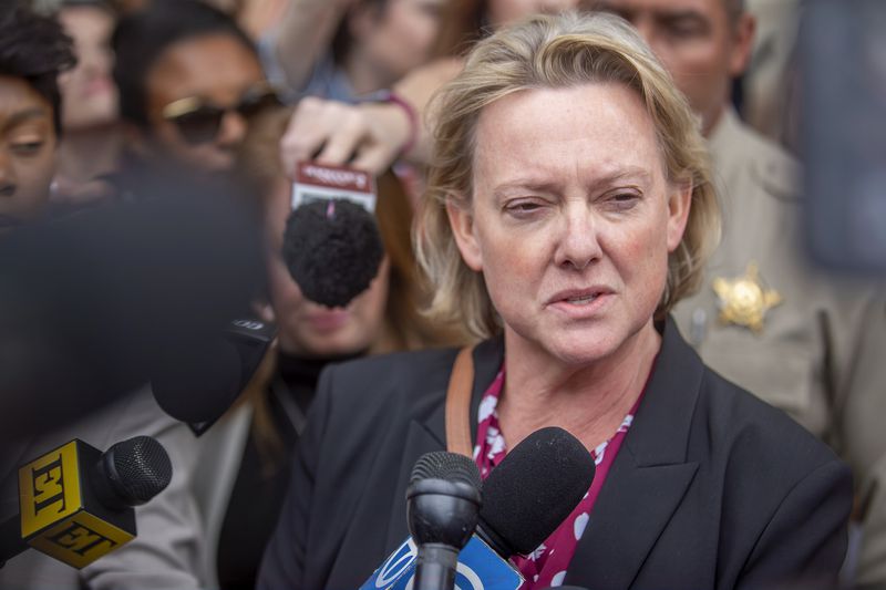 Prosecutor Kari Morrissey addresses the media after District Court Judge Mary Marlowe Sommer threw out the involuntary manslaughter case against actor Alec Baldwin for the 2021 fatal shooting of cinematographer Halyna Hutchins during filming of the Western movie "Rust," Friday, July 12, 2024, in Santa Fe, N.M. (Luis Sánchez Saturno/Santa Fe New Mexican via AP)