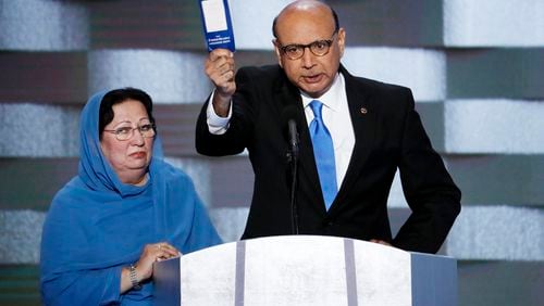 Khizr Khan, father of fallen U.S. Army Capt. Humayun S. M. Khan, speaks as his wife Ghazala listens during the final day of the Democratic National Convention in Philadelphia in 2016. AP/J. Scott Applewhite