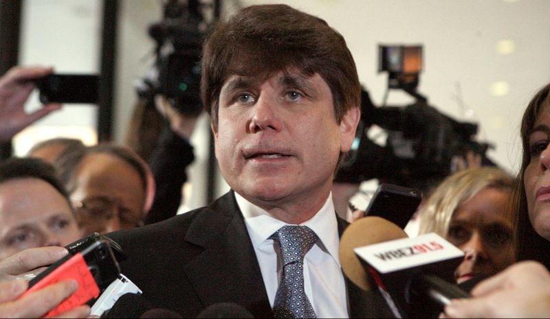 FILE PHOTO: Former Illinois Governor Rod Blagojevich pauses while speaking to the media at the Dirksen Federal Building December 7, 2011 in Chicago, Illinois. Blagojevich was sentenced to 14 years in prison after he was found guilty of 17 public corruption charges.  (Photo by Frank Polich/Getty Images)