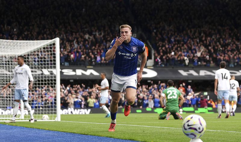 Ipswich Town's Liam Delap celebrates scoring his side's second goal during the British Premier League soccer match between Ipswich Town and Aston Villa at Portman Road, Ipswich, England, Sunday Sept. 29, 2024. (Zac Goodwin/PA via AP)