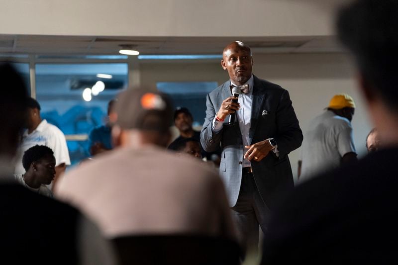 Mawuli Davis, an attorney and human rights organizer, facilitates a panel discussion on the candidacy of Vice President Kamala Harris during a Black Men Lab meeting, Monday, July 22, 2024, in Atlanta. (AP Photo/Stephanie Scarbrough)