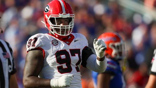 Georgia defensive lineman Warren Brinson (97) reacts after a defensive play during their game against Florida at EverBank Stadium, Saturday, October 27, 2023, in Jacksonville, Fl. Georgia won 43-20 against Florida. (Jason Getz / Jason.Getz@ajc.com)