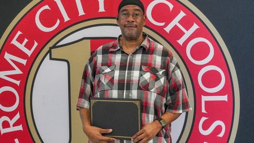 Rome City Schools bus driver Nakita Strickland was honored at an August 13, 2024 school-board meeting for his actions in a crash that occurred August 8 when his bus carrying members of the Rome High football team was struck by a car that had crossed into oncoming traffic. While the bus rolled over multiple times, no lives were lost in the wreck and injuries were relatively minor. According to a proclamation, “his dedication and swift actions ensured the safety of our students, and we are truly fortunate to have him as part of our team.” (Photo provided by Rome City Schools)