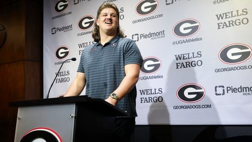 Georgia offensive lineman Tate Ratledge speaks to members of the media before their first day of spring football practice at the Butts-Mehre Heritage Hall, Tuesday, March 12, 2024, in Athens, Ga. (Jason Getz / jason.getz@ajc.com)