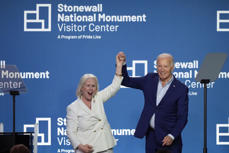 President Joe Biden, right, poses with Sen. Kirsten Gillibrand, D-N.Y., at the grand opening ceremony for the Stonewall National Monument Visitor Center, Friday, June 28, 2024, in New York. (AP Photo/Evan Vucci) (AP Photo/Julia Nikhinson)