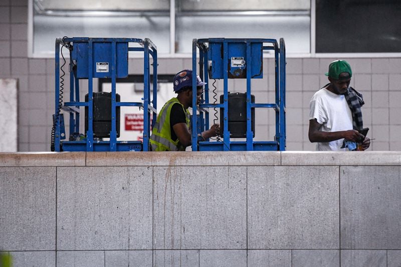 Construction workesr work on renovation in Five Point Station in Atlanta, Georgia on  Tuesday, June 25, 2024.  (Ziyu Julian Zhu / AJC)