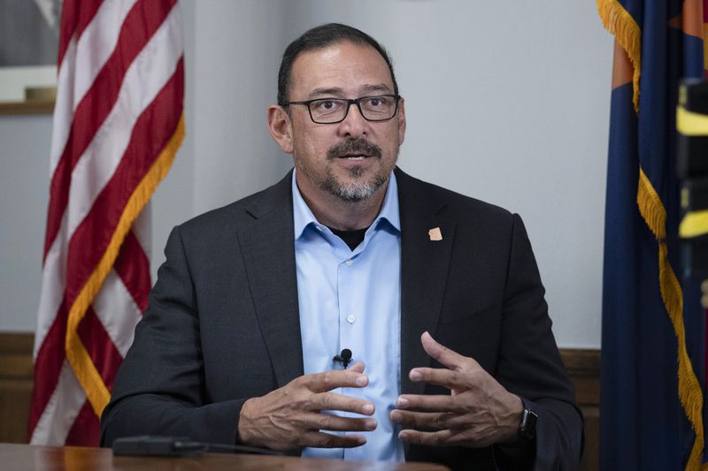 FILE - Arizona Secretary of State Adrian Fontes, a Democrat, speaks during an interview with the Associated Press in Arizona, Monday, March 4, 2024. (AP Photo/Serkan Gurbuz, File)