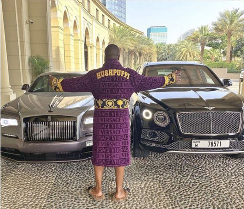 Hushpuppi’s social media posts typically show him posing in designer clothes and next to expensive cars.