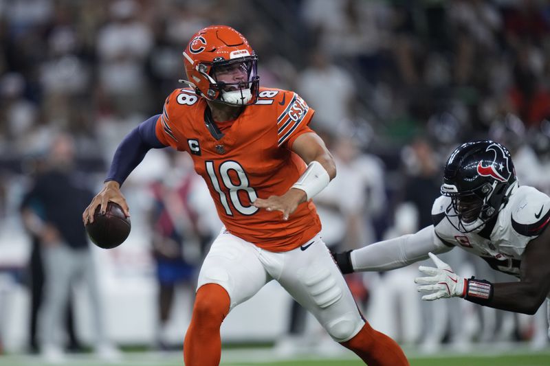 Chicago Bears quarterback Caleb Williams looks to pass during the first half of an NFL football game against the Houston Texans Sunday, Sept. 15, 2024, in Houston. (AP Photo/Eric Gay)