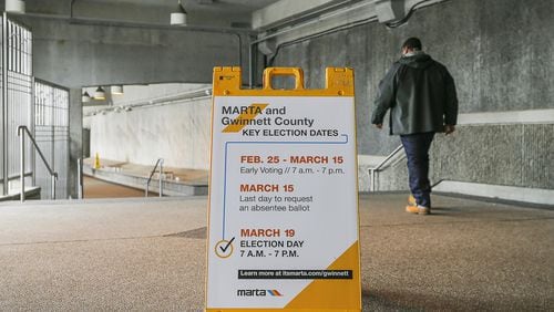 A sign indicating the MARTA and Gwinnett County transit referendum voting calendar is displayed at the MARTA Transit Station in Doraville on February 26, 2019.