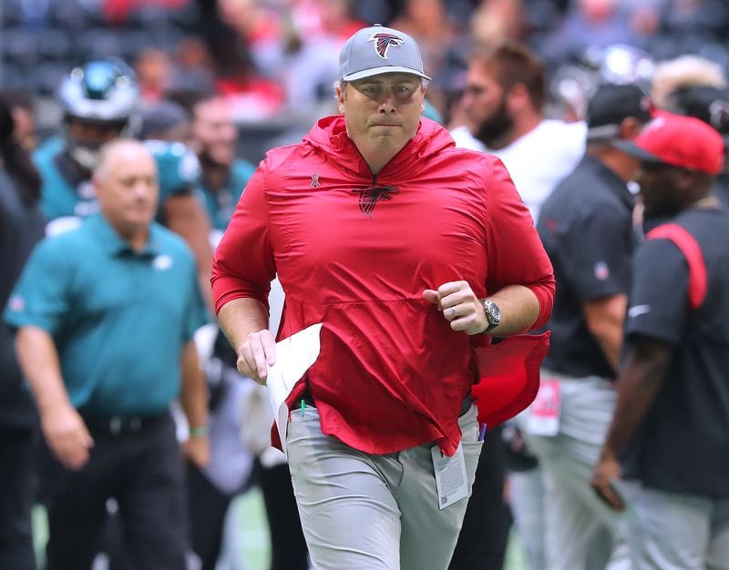 Falcons head coach Arthur Smith runs off the field after 32-6 to the Philadelphia Eagles in the season opener Sunday, Sept. 12, 2021, at Mercedes-Benz Stadium in Atlanta. (Curtis Compton / Curtis.Compton@ajc.com)