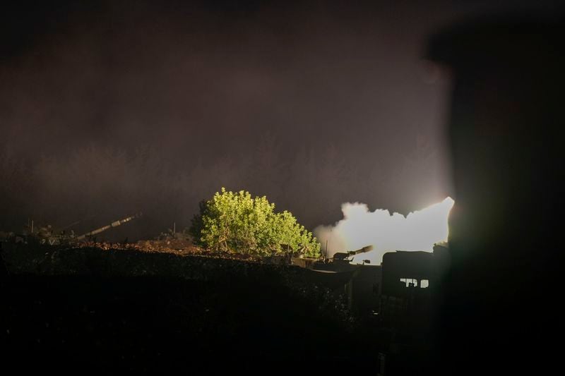 An Israeli mobile artillery unit fires a shell from northern Israel towards Lebanon, in a position near the Israel-Lebanon border, Monday, Sept. 30, 2024. (AP Photo/Baz Ratner)