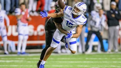 Louisiana-Lafayette cornerback Eric Garror defends on a pass that was intended for Georgia State wide receiver Sam Pinckney (15) during the second half an NCAA college football game in Lafayette, La., Thursday, Nov. 4, 2021. (AP Photo/Matthew Hinton)