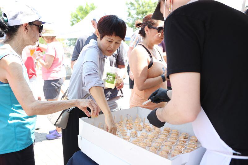 Pimento cheese samples are handed out during the Pimento Cheese Festival in Cary, North Carolina. Courtesy of Alyson Boyer Rode