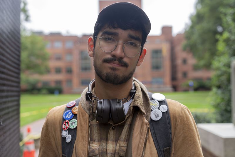 George Washington University student Ty Lindia poses for a photograph at the site of last spring's students tent encampment at George Washington University Yard in Washington, Wednesday, Oct. 2, 2024. (AP Photo/Jose Luis Magana)