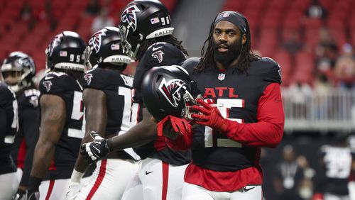 Atlanta Falcons linebacker Matthew Judon (15) warms-up before their game against the Jacksonville Jaguars in their preseason NFL football game at Mercedes-Benz Stadium, on Friday, Aug. 23, 2024, in Atlanta. (Jason Getz / AJC)
