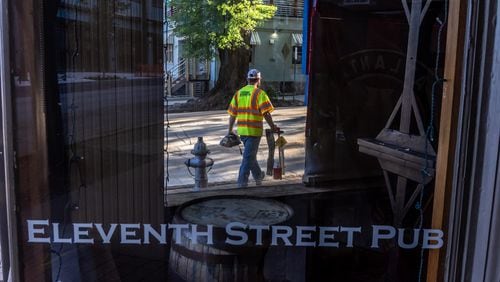 Eleventh Street Pub will reopen July 26, nearly two months after it was forced to closed due to a water main break. (John Spink/AJC)