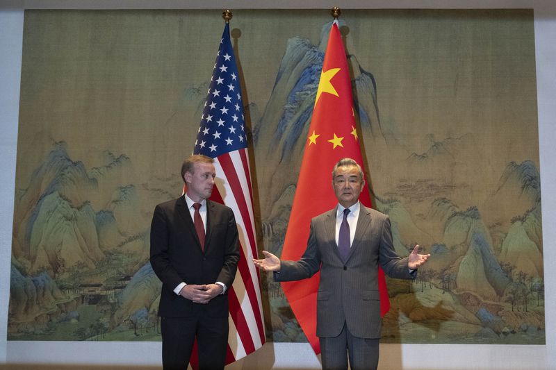 Wang Yi, right, the director of the Communist Party's Central Foreign Affairs Commission Office speaks before a talk with White House national security adviser Jake Sullivan, left, before their talk at Yanqi lake in Beijing, Tuesday, Aug. 27, 2024. (AP Photo/Ng Han Guan, Pool)