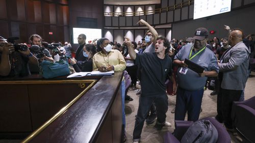 Protesters yell at council members after the vote passed 11 to 4 to approve legislation to fund the training center, on Tuesday, June 6, 2023, in Atlanta. (Jason Getz / Jason.Getz@ajc.com)